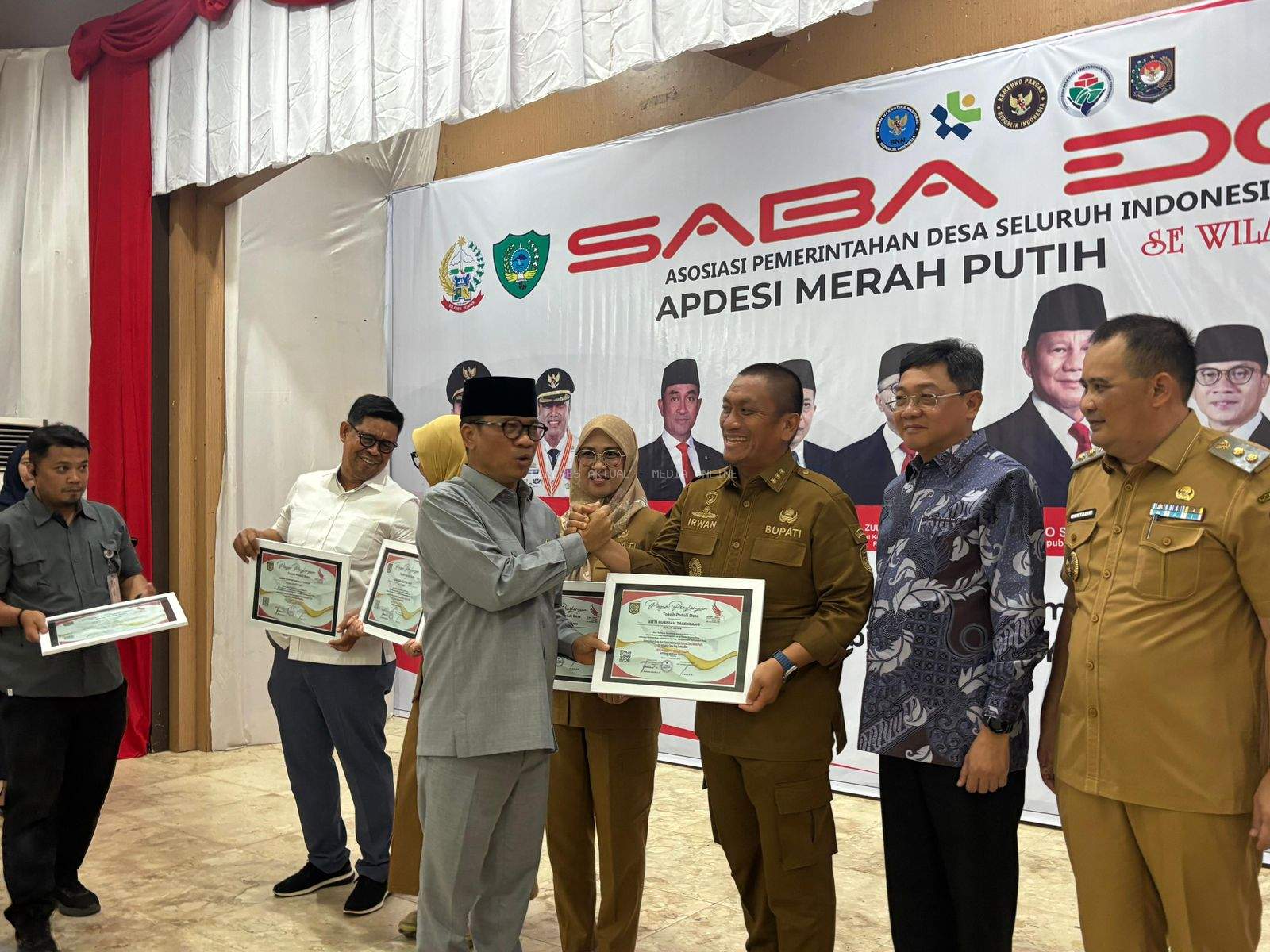 Bupati Luwu Timur Raih Penghargaan “Kepala Daerah yang Peduli Desa”